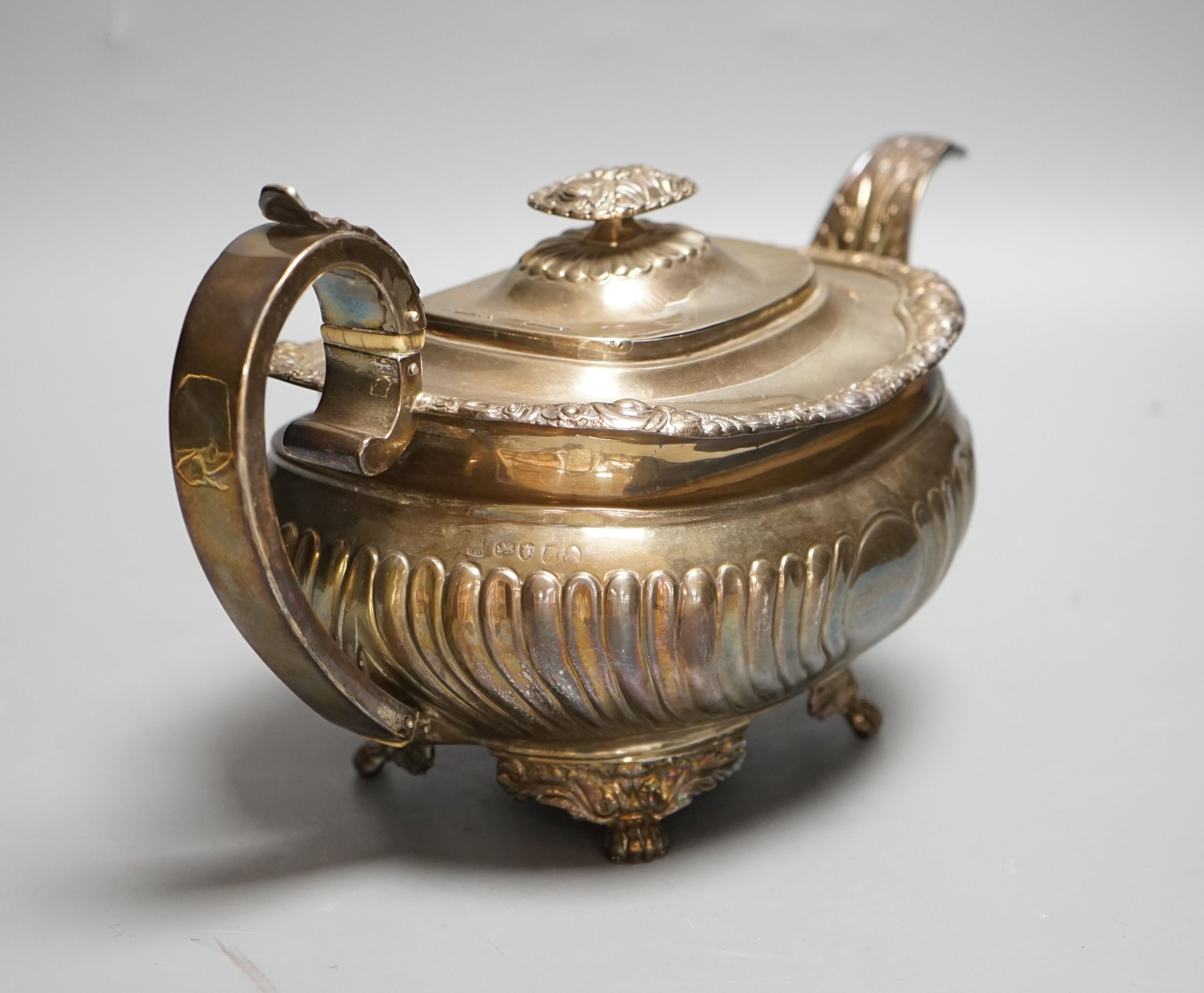 A George III silver teapot, maker's mark rubbed, London, 1817?, gross weight 26oz.